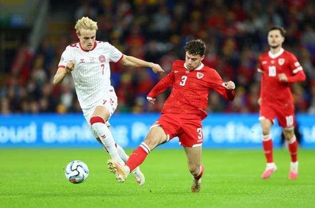 Victor Froholdt of Denmark and Neco Williams of Wales in action Wales v Denmark, UEFA Nations League, Football, Cardiff City Stadium, Cardiff, UK - 04 Oct 2026Cardiff Cardiff City Stadium United Kingdom  Copyright: xKieranxMcManus Shutterstockx 17185536h