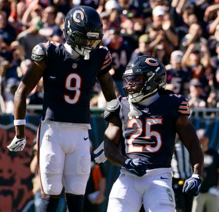 Chicago Bears running back Kyle Monangai (25) celebrates his first quarter touchdown against the New York Jets with Jahdae Walker (9) at Soldier Field in Chicago on Sunday, October 4, 2026.  CHI20261004104 MARKxBLACK
