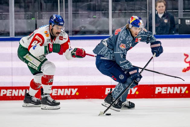 Trevor Parkes of the Augsburger Panther (84) can t stop Markus Eisenschmid of EHC Red Bull Munich (11) here. GER, EHC Red Bull Munich vs. Augsburger Panther, DEL, 2026–2027 season, Matchday 6, October 4, 2026. Photo: HMB Media, Heike Feiner Copyright: HMBxMedia HeikexFeiner