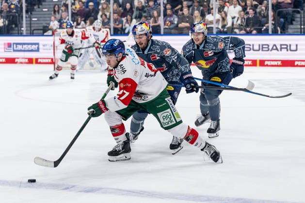 Kyle Mayhew, Augsburger Panther, 27, pursued by Taro Hirose, EHC Red Bull Munich, 17, and Brady Ferguson, EHC Red Bull Munich, 12 (GER), EHC Red Bull Munich vs. Augsburger Panther, DEL, 2026–2027 season, Matchday 6, October 4, 2026 Photo: HMB Media, Heike Feiner Copyright: HMBxMedia HeikexFeiner