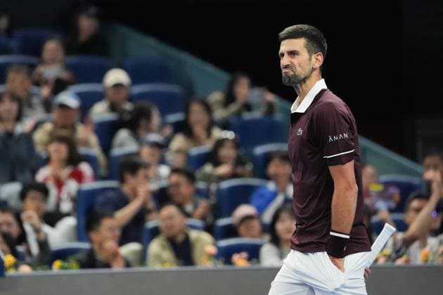 (261004) -- BEIJING, Oct. 4, 2026 -- Novak Djokovic reacts during the men s singles quarterfinal match between Alexander Zverev of Germany and Novak Djokovic of Serbia at 2026 China Open tennis tournament in Beijing, China, Oct. 4, 2026. ) (SP)CHINA-BEIJING-TENNIS-CHINA OPEN-MEN S SINGLES(CN) JuxHuanzong 