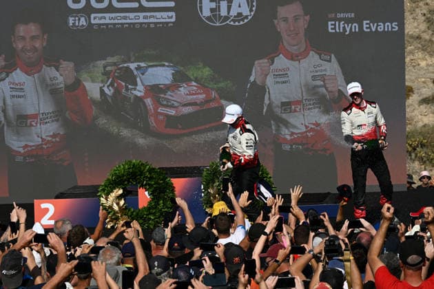 IPA89309634 - ,Driver Elfyn Evans and Co-Driver Scott Martin of the Toyota Gazoo Racing WRT team, driving the Toyota GR Yaris Rally1, celebrate their victory as champions during the FIA World Rally Championship WRC, Motorsport Rallye, WM Rally Italia Sardegna 2026 on October 4 in Alghero, Sardinia, Italy  Copyright: xLucaxBarsali IPAxSportx xx IPA89309634