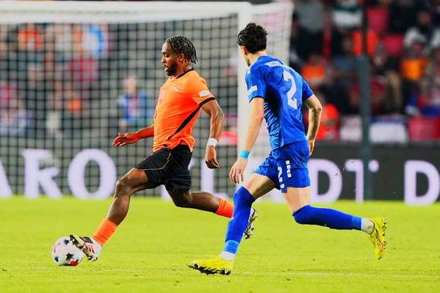 2026-10-04 UEFA Nations League: Netherlands v Serbia EINDHOVEN, NETHERLANDS - OCTOBER 4: Quinten Timber of Netherlands and Kosta Nedeljkovic of Serbia during the UEFA Nations League match between Netherlands and Serbia at Philips Stadion on October 4, 2026 in Eindhoven, Netherlands. Eindhoven Philips Stadion Netherlands Content not available for redistribution in The Netherlands directly or indirectly through any third parties. Copyright: xAndrexWeeningx