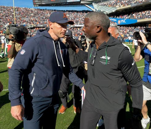 Chicago Bears head coach Ben Johnson shakes hands with New York Jets head coach Aaron Glenn after the Bears 23-12 win at Soldier Field in Chicago on Sunday, October 4, 2026.  CHI20261004128 MARKxBLACK