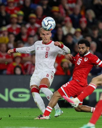 Wales v Denmark UEFA Nations League Gustav Isaksen of Denmark crosses the ball past Jay Dasilva of Wales during the UEFA Nations League match at the Cardiff City Stadium, Cardiff 04 10 2026 UK Newspapers OUT Copyright: xKaraxThomasx FIL-24028-0070