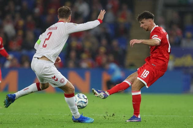 Wales v Denmark UEFA Nations League Mark Harris of Wales kicks the ball past Joachim Andersen of Denmark during the UEFA Nations League match at the Cardiff City Stadium, Cardiff 04 10 2026 UK Newspapers OUT Copyright: xKaraxThomasx FIL-24028-0076