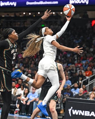 ATLANTA, GA - OCTOBER 04: Atlanta guard Jordin Canada (3) drives to the basket during the WNBA, Basketball Damen, USA second round playoff game between the New York Liberty and the Atlanta Dream on October 4th, 2026 at State Farm Arena in Atlanta, GA. (Photo by Rich von Biberstein Icon Sportswire) WNBA: OCT 04 New York Liberty at Atlanta Dream EDITORIAL USE ONLY Icon261004028