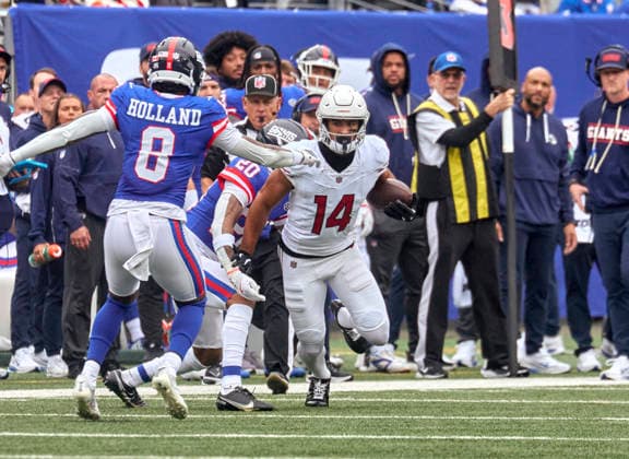 Arizona Cardinals wide receiver Michael Wilson (14) makes a catch and run against the New York Giants during a NFL, American Football Herren, USA game at MetLife Stadium in East Rutherford, New Jersey. CSM NFL 2026: Cardinals Vs Giants OCT 04  - ZUMAc04_ 20261004_zma_c04_173 Copyright: xDuncanxWilliamsx