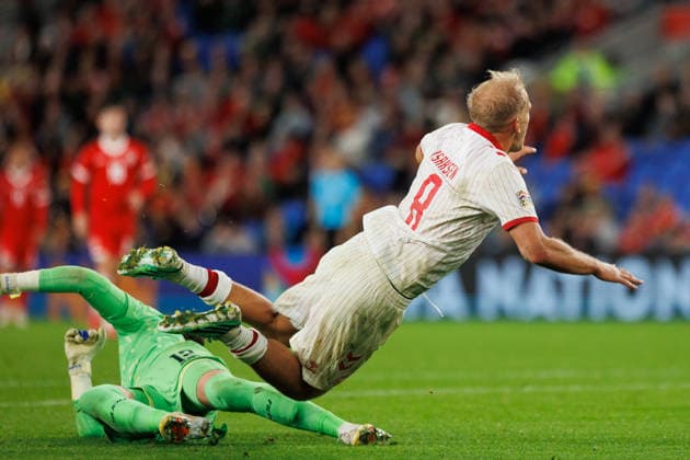 RECORD DATE NOT STATED 4th October 2026; Cardiff City Stadium, Cardiff, Wales; UEFA Nations League Football, Wales versus Denmark; Gustav Isaksen of Denmark is fouled by Danny Ward of Wales to draw penalty kick AmandaxMcMaster