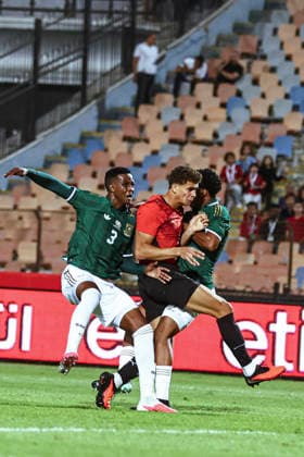 Cairo Egypt South Africa Match Egyptian forward Hamza Abdelkarim competes for position against South African defenders at Cairo International Stadium in Cairo, Egypt on October 4, 2026. The International Friendly, Länderspiel, Nationalmannschaft match serves as preparation for both national teams ahead of upcoming regional and continental football competitions. Cairo Cairo Egypt Copyright: xMostafaxElxShahatx