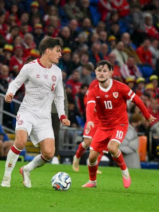 Football - 2026 2027 UEFA Nations League - League A, Group Four: Wales vs. Denmark - Cardiff City Stadium - Sunday 4th October 2026 Joakim Maehle DENMARK & Liam Cullen WALES colorsport winston bynorth 