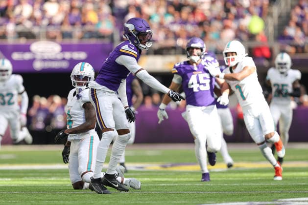MINNEAPOLIS, MN - OCTOBER 04: Minnesota Vikings cornerback Zemaiah Vaughn (5) celebrates tackling Miami Dolphins wide receiver Malik Washington (6) during the first half of the NFL, American Football Herren, USA game between the Miami Dolphins and the Minnesota Vikings on October 4th, 2026, at U.S. Bank Stadium in Minneapolis, MN. (Photo by Bailey Hillesheim Icon Sportswire) NFL: OCT 04 Dolphins at Vikings EDITORIAL USE ONLY Icon20261004021
