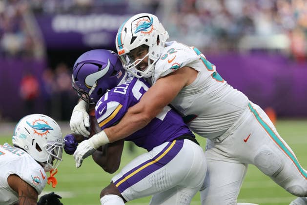 MINNEAPOLIS, MN - OCTOBER 04: Miami Dolphins defensive tackle Zach Sieler (92) tackles Minnesota Vikings running back Demond Claiborne (21) during the second half of the NFL, American Football Herren, USA game between the Miami Dolphins and the Minnesota Vikings on October 4th, 2026, at U.S. Bank Stadium in Minneapolis, MN. (Photo by Bailey Hillesheim Icon Sportswire) NFL: OCT 04 Dolphins at Vikings EDITORIAL USE ONLY Icon20261004036