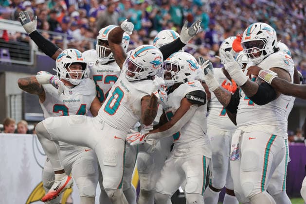MINNEAPOLIS, MN - OCTOBER 04: Miami Dolphins running back Ollie Gordon II (0) celebrates scoring a touchdown during the second half of the NFL, American Football Herren, USA game between the Miami Dolphins and the Minnesota Vikings on October 4th, 2026, at U.S. Bank Stadium in Minneapolis, MN. (Photo by Bailey Hillesheim Icon Sportswire) NFL: OCT 04 Dolphins at Vikings EDITORIAL USE ONLY Icon20261004042