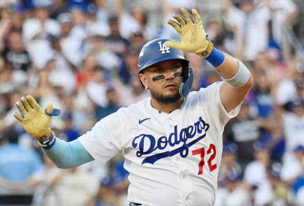 Los Angeles Dodgers Miguel Rojas (72) celebrates on second base after hitting a double against the Atlanta Braves in the third inning in an MLB, Baseball Herren, USA National League Division Series game at Dodger Stadium in Los Angeles, California, on Sunday, October 4, 2026.  LAP20261004707 JIMxRUYMEN