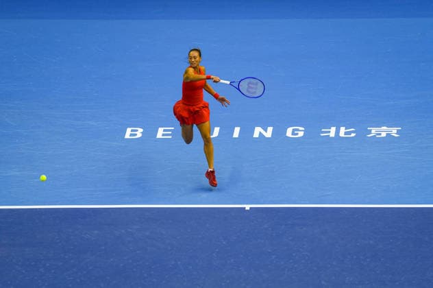 (261005) -- BEIJING, Oct. 5, 2026 -- Zheng Qinwen of China hits a return during the women s singles round of 32 match against Marie Bouzkova of the Czech Republic at 2026 China Open tennis tournament in Beijing, China, Oct. 5, 2026. ) (SP)CHINA-BEIJING-TENNIS-CHINA OPEN-WOMEN S SINGLES(CN) SunxFei 