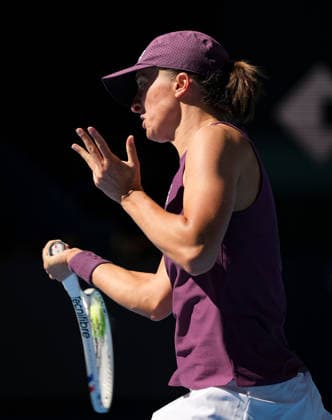 (261005) -- BEIJING, Oct. 5, 2026 -- Iga Swiatek of Poland hits a return during the women s singles round of 32 match against Donna Vekic of Croatia at 2026 China Open tennis tournament in Beijing, China, Oct. 5, 2026. ) (SP)CHINA-BEIJING-TENNIS-CHINA OPEN-WOMEN S SINGLES(CN) SunxFei 