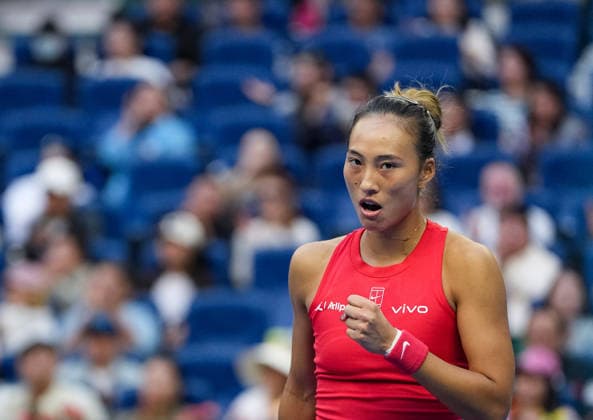 (261005) -- BEIJING, Oct. 5, 2026 -- Zheng Qinwen of China celebrates scoring during the women s singles round of 32 match against Marie Bouzkova of the Czech Republic at 2026 China Open tennis tournament in Beijing, China, Oct. 5, 2026. ) (SP)CHINA-BEIJING-TENNIS-CHINA OPEN-WOMEN S SINGLES(CN) SunxFei 