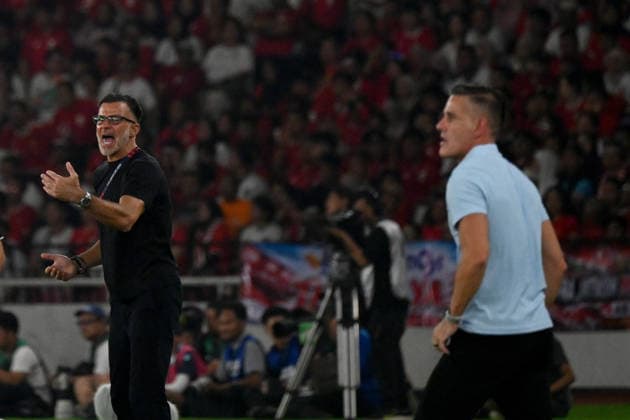 (261005) -- JAKARTA, Oct. 5, 2026 -- Anthony Hudson (L), head coach of Thailand, reacts during the FIFA ASEAN Cup 2026 Division 1 Final Match between Indonesia and Thailand at Gelora Bung Karno Stadium in Jakarta, Indonesia, Oct. 5, 2026. ) (SP)INDONESIA-JAKARTA-FOOTBALL-FIFA ASEAN CUP 2026-DIVISION 1-FINAL-INDONESIA VS THAILAND AgungxKuncahyaxB. 