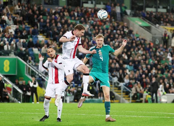UEFA Nations League Group Stage Northern Ireland vs Georgia 5 10 2026 Northern Ireland™s Tom Atcheson with Georgia™s Budu Zivzivadze and Giorgi Kochorashvili Tom Atcheson with Budu Zivzivadze and Giorgi Kochorashvili 5 10 2026  Copyright: xx 051026JP2football008