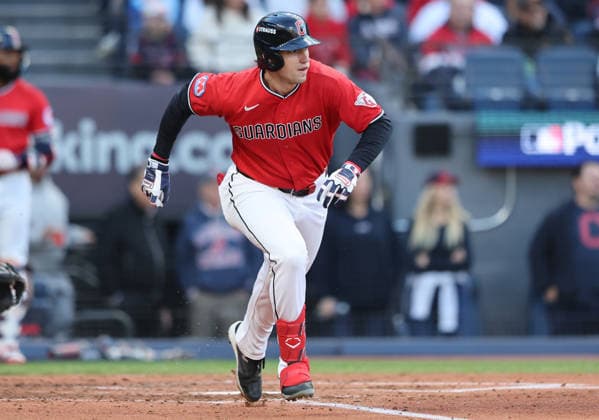 Cleveland Guardians Chase DeLauter (24) heads to first base after hitting a single against the Chicago White Sox in the third inning in an MLB, Baseball Herren, USA American League Division Series playoff game at Progressive Field in Cleveland, Ohio, on Monday, October 5, 2026.  CLE20261005710 AARONxJOSEFCZYK