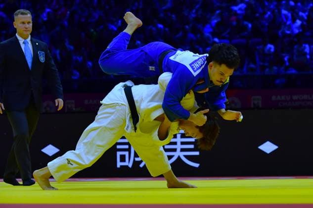 (261006) -- BAKU, Oct. 6, 2026 -- Abe Hifumi (below) of Japan competes against David Garcia Torne of Spain during the men s 66kg gold medal match at the World Judo Championships 2026 in Baku, Azerbaijan, Oct. 5, 2026. ) (SP)AZERBAIJAN-BAKU-WORLD CHAMPIONSHIPS 2026-MEN S 66KG ChenxJunfeng 