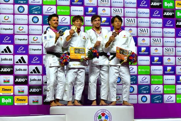 (261006) -- BAKU, Oct. 6, 2026 -- Gold medalist Abe Hifumi (2nd L) of Japan, silver medalist David Garcia Torne (1st L) of Spain, bronze medalists Denis Vieru (2nd R) of Moldova and Takeoka Takeshi of Japan pose for photograph during the men s 66kg awarding ceremony at the World Judo Championships 2026 in Baku, Azerbaijan, Oct. 5, 2026. ) (SP)AZERBAIJAN-BAKU-WORLD CHAMPIONSHIPS 2026-MEN S 66KG ChenxJunfeng 
