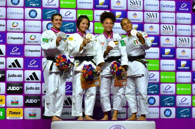 (261006) -- BAKU, Oct. 6, 2026 -- Gold medalist Abe Uta (2nd L) of Japan, silver medalist Ariane Toro Soler (1st L) of Spain, bronze medalists Ayumi Leiva Sanchez (2nd R) of Spain and Odette Giuffrida of Italy pose for photograph during the women s 52kg awarding ceremony at the World Judo Championships 2026 in Baku, Azerbaijan, Oct. 5, 2026. ) (SP)AZERBAIJAN-BAKU-WORLD CHAMPIONSHIPS 2026-WOMEN S 52KG ChenxJunfeng 