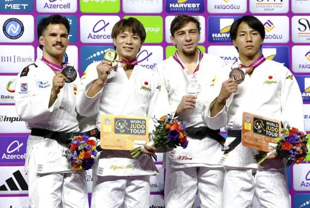 Judo: World championships Hifumi Abe (2nd from L) of Japan poses after winning the men s 66-kilogram gold at the judo world championships in Baku, Azerbaijan, on Oct. 5, 2026, alongside silver medalist David Garcia Torne (far L) of Spain, and bronze medalists Takeshi Takeoka of Japan (far R) and Denis Vieru of Moldova.  A14AA0005630223P