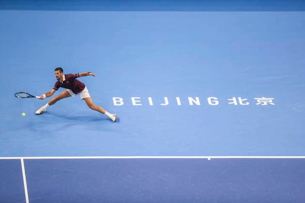 (261006) -- BEIJING, Oct. 6, 2026 -- Novak Djokovic of Serbia hits a return during the men s singles final match against Alex de Minaur of Australia at 2026 China Open tennis tournament in Beijing, China, Oct. 6, 2026. (Photo by Xinhua) (SP)CHINA-BEIJING-TENNIS-CHINA OPEN-MEN S SINGLES-FINAL(CN) MaxZihan 