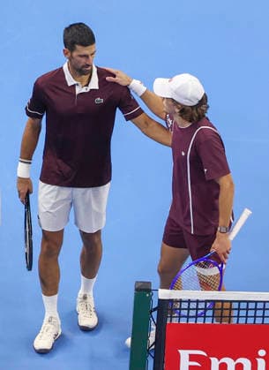 (261006) -- BEIJING, Oct. 6, 2026 -- Novak Djokovic (L) of Serbia communicates with Alex de Minaur of Australia after the men s singles final match at 2026 China Open tennis tournament in Beijing, China, Oct. 6, 2026. (Photo by Xinhua) (SP)CHINA-BEIJING-TENNIS-CHINA OPEN-MEN S SINGLES-FINAL(CN) MaxZihan 