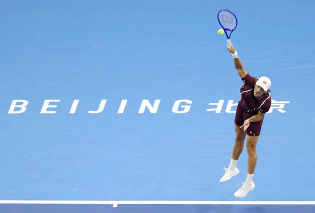 (261006) -- BEIJING, Oct. 6, 2026 -- Alex de Minaur of Australia serves during the men s singles final against Novak Djokovic of Serbia at 2026 China Open tennis tournament in Beijing, China, Oct. 6, 2026. ) (SP)CHINA-BEIJING-TENNIS-CHINA OPEN-MEN S SINGLES-FINAL(CN) ZhangxChenlin 
