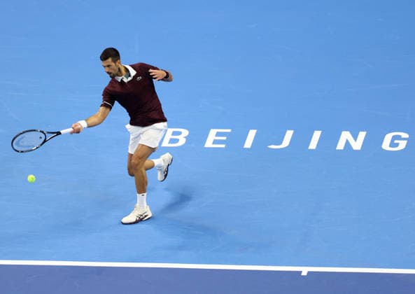 (261006) -- BEIJING, Oct. 6, 2026 -- Novak Djokovic of Serbia hits a return during the men s singles final against Alex de Minaur of Australia at 2026 China Open tennis tournament in Beijing, China, Oct. 6, 2026. ) (SP)CHINA-BEIJING-TENNIS-CHINA OPEN-MEN S SINGLES-FINAL(CN) ZhangxChenlin 