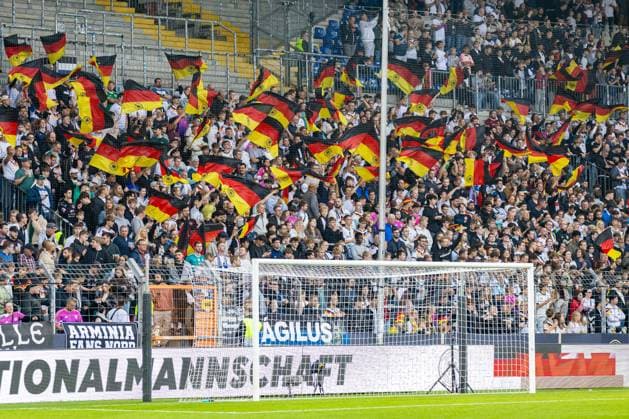 Fans of Germany s U21 team wave German flags (GER); Germany (GER) vs. Georgia (GEO), soccer, UEFA U21 European Championship Qualifiers, Group F, Matchday 13, 2026–2027 season, October 6, 2026 GER, Germany GER vs. Georgia GEO, soccer, UEFA U21 European Championship Qualifiers, Group F, Matchday 13, 2026–2027 season, October 6, 2026, Bielefeld Copyright: xEibner-Pressefoto JanxRollingerx EP_JSK
