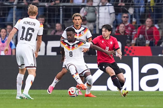 October 6, 2026, xydrx, Men s, Soccer, International Match, U21, European Championship Qualifiers, Germany vs. Georgia, 2026–2027 Season, Schüco Arena, Noel Aseko (GER), No. 8 in a tackle against Nikoloz Dadiani (GEO), No. 10. DFB regulations prohibit any use of photographs as image sequences and or quasi-video. Copyright: HMBxMedia YannisxDreimann