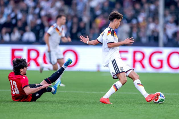 October 6, 2026, Soccer, U-21 International Match, Germany vs. Georgia, 2027 U-21 European Championship Qualifiers, Almstadion Bielefeld: Noah Darvich (U21 GER 17) in a tackle against Halid Doltmourziev (U21 Georgia 13). DFB regulations prohibit any use of photographs as image sequences and or quasi-video. North Rhine-Westphalia, Germany