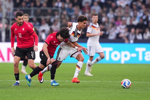 October 6, 2026, xydrx, Men s, Soccer, International Match, U21, European Championship Qualifiers, Germany vs. Georgia, 2026–2027 Season, Schüco Arena, Halid Doltmourziev (GEO), No. 13 in a tackle against Noah Darvich (GER), No. 17. DFB regulations prohibit any use of photographs as image sequences and or quasi-video. Copyright: HMBxMedia YannisxDreimann