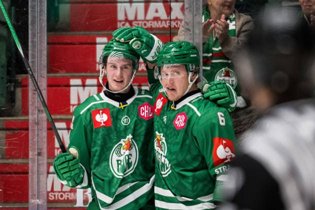 October 6, 2026: Tinus Luc Koblar and Paul Ladue of Rögle celebrate after scoring the 2-0 goal during the CHL game between Rögle and Davos on October 6, 2026 in Ängelholm. Photo by Niclas Jönsson, BILDBYRAN COP 273 NO0449. ice hockey, CHL, Champions Hockey League, Rögle, Davos, Rögle BBENG, cheering, celebrates Copyright: NICLASxJÖNSSON BB261006NO022