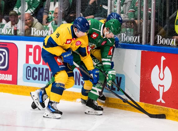 October 6, 2026: Adam Tambellini of Davos and Albin Sundsvik of Rögle during the CHL game between Rögle and Davos on October 6, 2026 in Ängelholm. Photo by Niclas Jönsson, BILDBYRAN COP 273 NO0449. ice hockey, CHL, Champions Hockey League, Rögle, Davos, Rögle BBENG, ice hockey, CHL, Champions Hockey League, Rögle, Davos, Rögle BBENG  Copyright: NICLASxJÖNSSON BB261006NO024