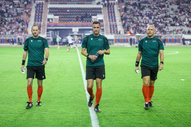 Croatia v Spain - UEFA Nations League 2026 27 Group A3 MD4 Referee Erik Lambrechts (C) and assistant referees Jo De Weirdt (L) and Kevin Monteny (R) warm up prior to the UEFA Nations League 2026 27 group phase match between Croatia and Spain at Stadion Poljud on October 6, 2026 in Split, Croatia.  SanjinxStrukic PIXSELL