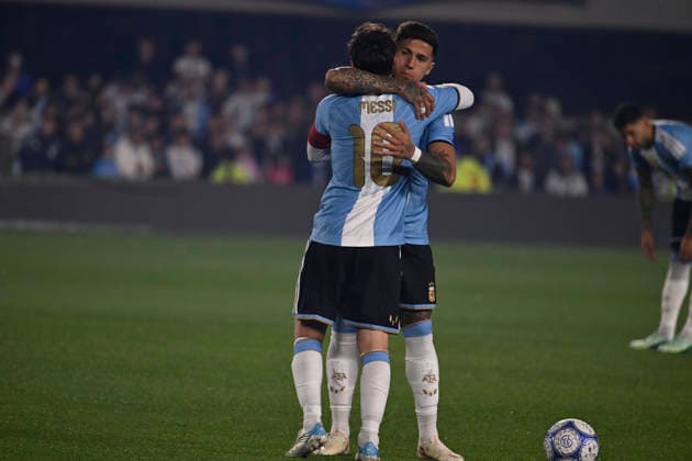 BUENOS AIRES, ARGENTINA - OCTOBER 06 : Forward Lionel Messi 10 of Argentina high-fives teammate Enzo Fernandez 8 during an International Friendly, Länderspiel, Nationalmannschaft match against Benin at Estadio Monumental on October 06, 2026 in Buenos Aires, Argentina. This historic match marks the final international appearance who wore a commemorative special-edition kit replacing the traditional manufacturer branding with his personal signature logo. Photo by SFSI Argentina national team, Nationalteam v Benin Copyright: xSFSIx