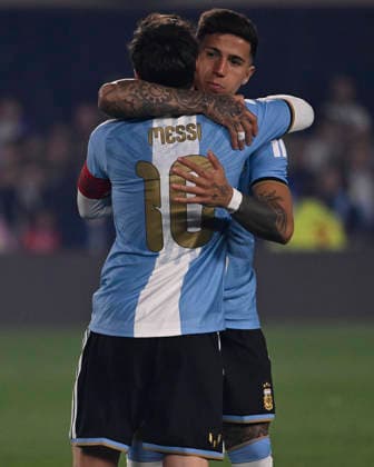 BUENOS AIRES, ARGENTINA - OCTOBER 06 : Forward Lionel Messi 10 of Argentina high-fives teammate Enzo Fernandez 8 during an International Friendly, Länderspiel, Nationalmannschaft match against Benin at Estadio Monumental on October 06, 2026 in Buenos Aires, Argentina. This historic match marks the final international appearance who wore a commemorative special-edition kit replacing the traditional manufacturer branding with his personal signature logo. Photo by SFSI Argentina national team, Nationalteam v Benin Copyright: xSFSIx