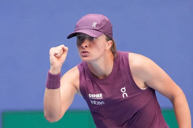 (261007) -- BEIJING, Oct. 7, 2026 -- Iga Swiatek reacts during the women s singles fourth round match between Iga Swiatek of Poland and Iva Jovic of the United States at 2026 China Open tennis tournament in Beijing, China, Oct. 7, 2026. ) (SP)CHINA-BEIJING-TENNIS-CHINA OPEN-WOMEN S SINGLES (CN) JuxHuanzong 