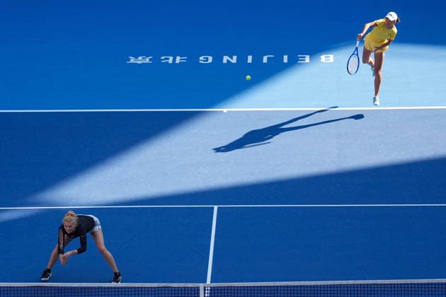 (261007) -- BEIJING, Oct. 7, 2026 -- Katerina Siniakova Zhang Shuai (R) compete during the women s doubles round of 16 match between Katerina Siniakova(the Cezch Republic) Zhang Shuai(China) and Nikola Bartunkova(the Cezch Republic) Maja Chwalinska(Poland) at 2026 China Open tennis tournament in Beijing, China, Oct. 7, 2026. ) (SP)CHINA-BEIJING-TENNIS-CHINA OPEN-WOMEN S DOUBLES (CN) JuxHuanzong 