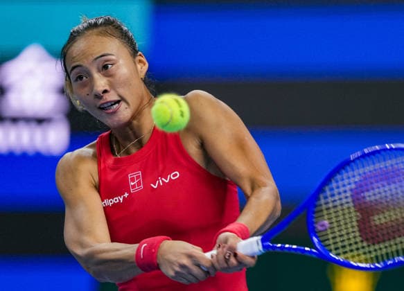(261007) -- BEIJING, Oct. 7, 2026 -- Zheng Qinwen competes during the women s singles fourth round match between Zheng Qinwen of China and Alina Charaeva of Armenia at 2026 China Open tennis tournament in Beijing, China, Oct. 7, 2026. ) (SP)CHINA-BEIJING-TENNIS-CHINA OPEN-WOMEN S SINGLES (CN) SunxFei 