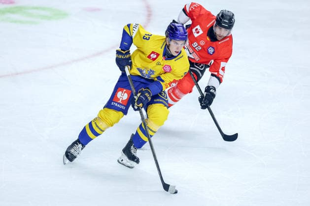 October 7, 2026, Ice Hockey, CHL, Kölner Haie vs. Blue Fox Herning, Champions Hockey League 2026–27, Matchday 5, 2026–27 Season, Lanxess Arena, Cologne: Kasper Bunch Larsen of Blue Fox Herning (33) battles Marcel Noebels of the Kölner Haie (92) in North Rhine-Westphalia, Germany