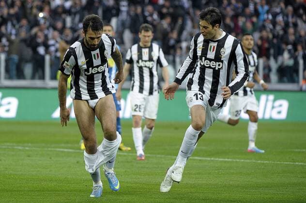 Football, Italy, striptease goal celebration by Mirko Vucinic