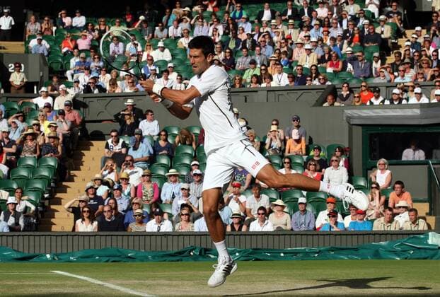 Tennis, Wimbledon, Novak Djokovic defeats Tommy Haas