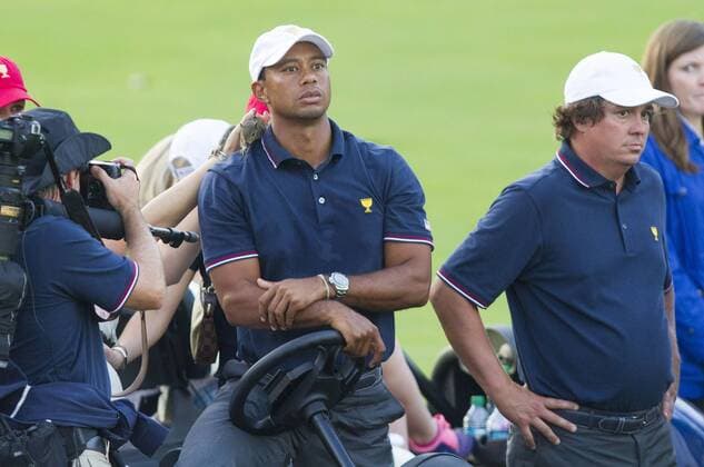 Golf, The Presidents Cup, Tiger Woods with squirrel on his shoulder