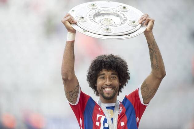 Football, Bayern Munich brings Dante back as amateur coach, archive pictures